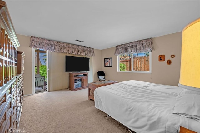23316 Gray Fox Dr, Canyon Lake, CA 92587 - carpeted bedroom featuring access to exterior and multiple windows