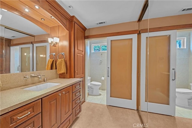 23316 Gray Fox Dr, Canyon Lake, CA 92587 - bathroom with toilet, tile patterned floors, and vanity