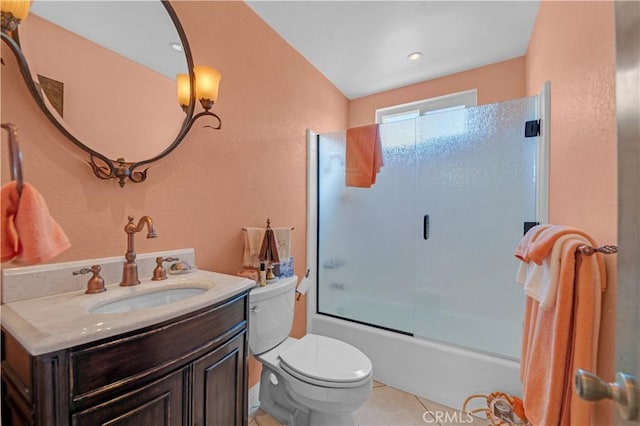 23316 Gray Fox Dr, Canyon Lake, CA 92587 - bathroom with toilet, a textured wall, tile patterned flooring, enclosed tub / shower combo, and vanity