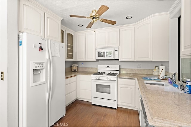 179 Chippewa Ln, Lake Arrowhead, CA 92352 - kitchen with white appliances, a sink, light countertops, dark wood finished floors, and white cabinets