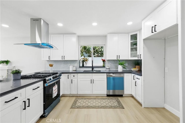 1608 E Helmick St, Carson, CA 90746 - kitchen featuring gas stove, stainless steel dishwasher, island exhaust hood, a sink, and light wood-style floors