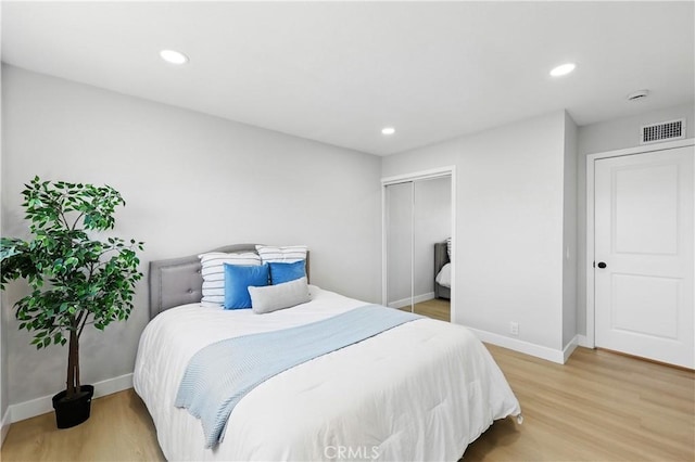 1608 E Helmick St, Carson, CA 90746 - bedroom with light wood finished floors, baseboards, a closet, and recessed lighting