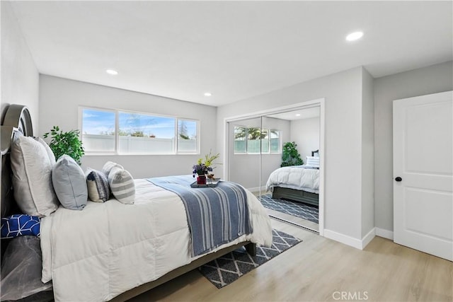 1608 E Helmick St, Carson, CA 90746 - bedroom featuring wood finished floors, recessed lighting, a closet, and baseboards