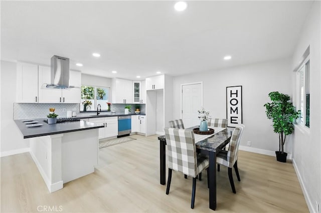 1608 E Helmick St, Carson, CA 90746 - dining space with light wood-type flooring, recessed lighting, and baseboards