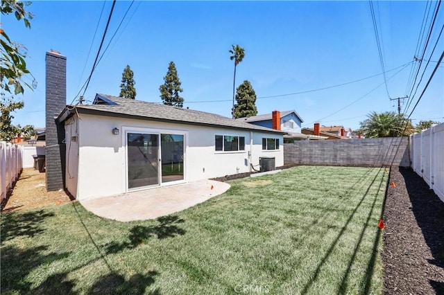 1608 E Helmick St, Carson, CA 90746 - back of house with stucco siding, a patio area, a chimney, and central AC unit