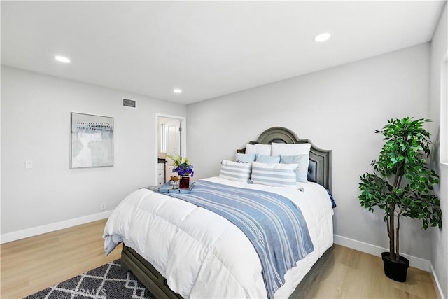 1608 E Helmick St, Carson, CA 90746 - bedroom featuring baseboards, wood finished floors, and recessed lighting