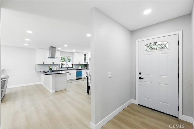 1608 E Helmick St, Carson, CA 90746 - foyer featuring light wood-type flooring, recessed lighting, and baseboards