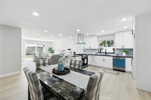 1608 E Helmick St, Carson, CA 90746 - dining area with light wood-type flooring, recessed lighting, and baseboards
