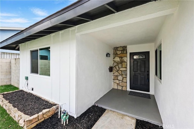 1608 E Helmick St, Carson, CA 90746 - entrance to property with fence, stone siding, and stucco siding