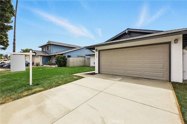 1608 E Helmick St, Carson, CA 90746 - view of front of home featuring driveway, stucco siding, and an attached garage