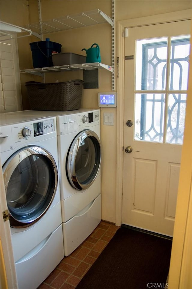 2619 Mary St, La Crescenta, CA 91214 - laundry room with washing machine and dryer, brick patterned flooring, and healthy amount of natural light