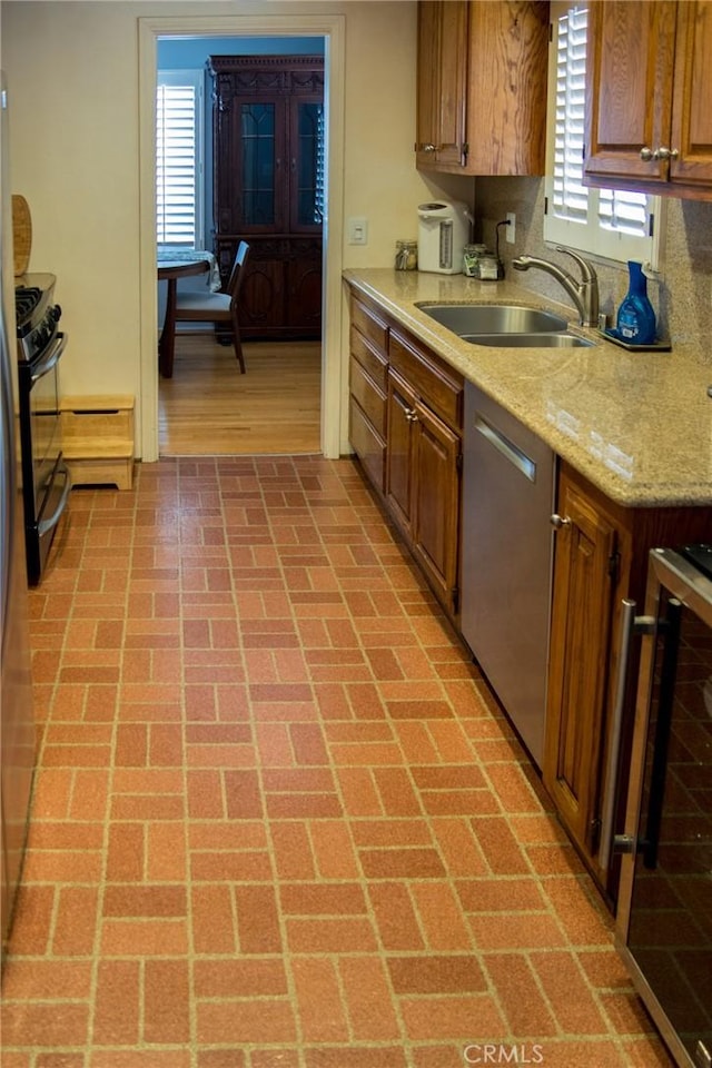 2619 Mary St, La Crescenta, CA 91214 - kitchen featuring a sink, stainless steel dishwasher, brick patterned floors, beverage cooler, and brown cabinets
