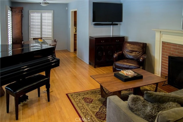 2619 Mary St, La Crescenta, CA 91214 - living area with a brick fireplace and light wood finished floors