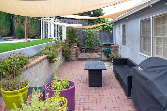 2619 Mary St, La Crescenta, CA 91214 - view of patio / terrace featuring a grill, a fenced backyard, and an outdoor living space with a fire pit
