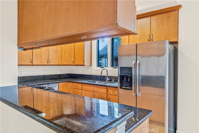 66 N Allen Ave Unit 3, Pasadena, CA 91106 - kitchen with stainless steel fridge, a sink, dark stone countertops, and a peninsula