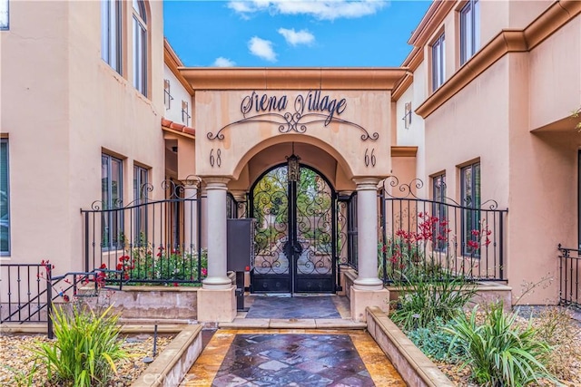 66 N Allen Ave Unit 3, Pasadena, CA 91106 - doorway to property with stucco siding, a gate, and french doors