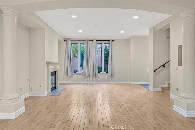 66 N Allen Ave Unit 3, Pasadena, CA 91106 - unfurnished living room with light wood-style floors, decorative columns, baseboards, crown molding, and stairway