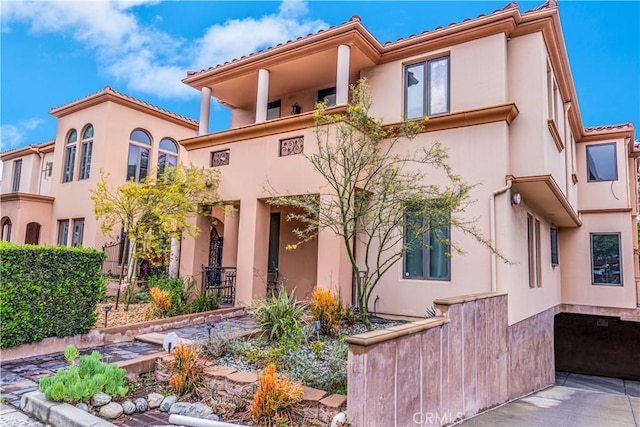 66 N Allen Ave Unit 3, Pasadena, CA 91106 - back of house featuring stucco siding and a tiled roof