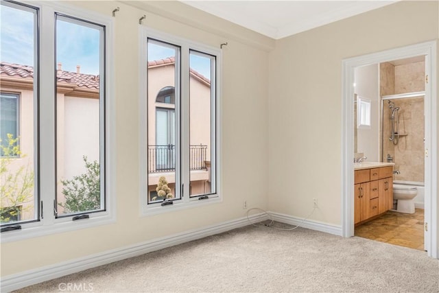 66 N Allen Ave Unit 3, Pasadena, CA 91106 - unfurnished bedroom with light colored carpet, multiple windows, baseboards, ensuite bathroom, and ornamental molding