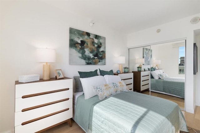 850 E Ocean Blvd Unit 602, Long Beach, CA 90802 - bedroom with wood finished floors and a closet