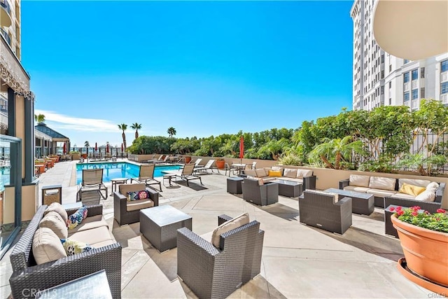 850 E Ocean Blvd Unit 602, Long Beach, CA 90802 - view of patio / terrace with outdoor lounge area and a community pool