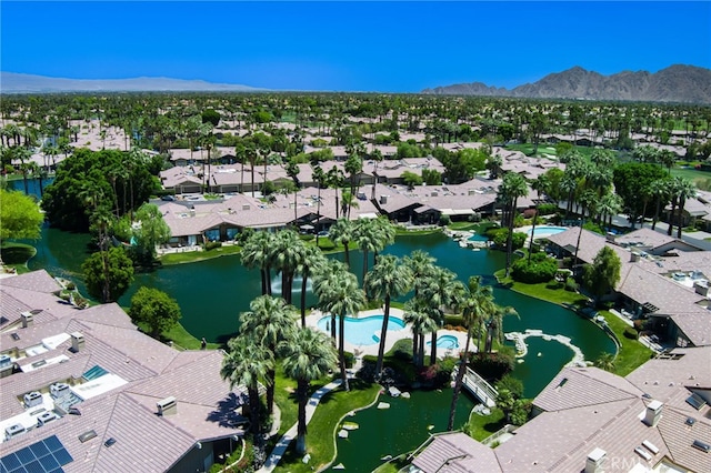 aerial perspective of suburban area with a water and mountain view