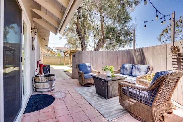 17301 Elsinore Cir, Huntington Beach, CA 92647 - view of patio featuring outdoor lounge area and a fenced backyard