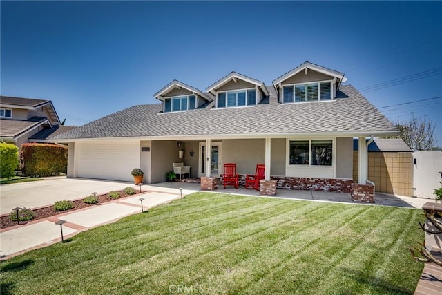 17301 Elsinore Cir, Huntington Beach, CA 92647 - view of front of property with stucco siding, a porch, roof with shingles, a front lawn, and a garage