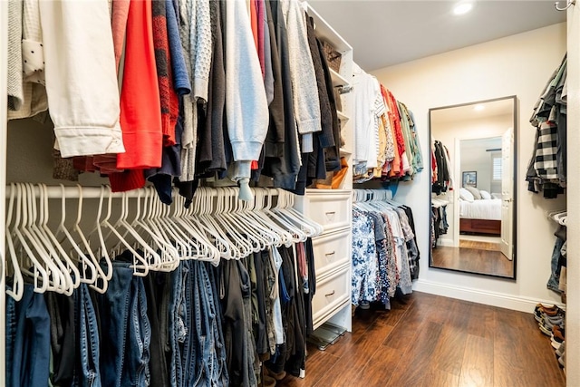 17301 Elsinore Cir, Huntington Beach, CA 92647 - walk in closet featuring wood finished floors