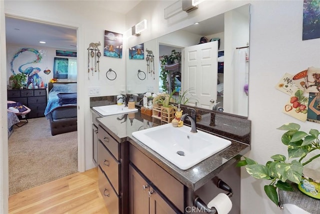 6151 N Libby Rd, Paradise, CA 95969 - ensuite bathroom with wood finished floors and vanity