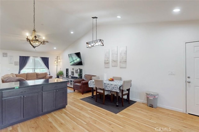 6151 N Libby Rd, Paradise, CA 95969 - dining space with light wood-type flooring, recessed lighting, vaulted ceiling, and baseboards