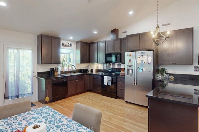 6151 N Libby Rd, Paradise, CA 95969 - kitchen featuring black appliances, a sink, vaulted ceiling, dark brown cabinets, and light wood-style floors