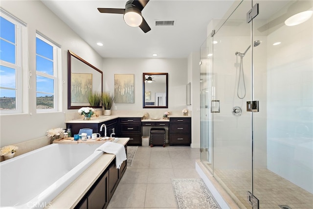 7051 Sitio Caliente, Carlsbad, CA 92009 - bathroom featuring ceiling fan, vanity, a shower stall, tile patterned floors, and recessed lighting