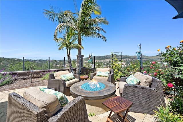 7051 Sitio Caliente, Carlsbad, CA 92009 - view of patio featuring an outdoor living space with a fire pit and a mountain view