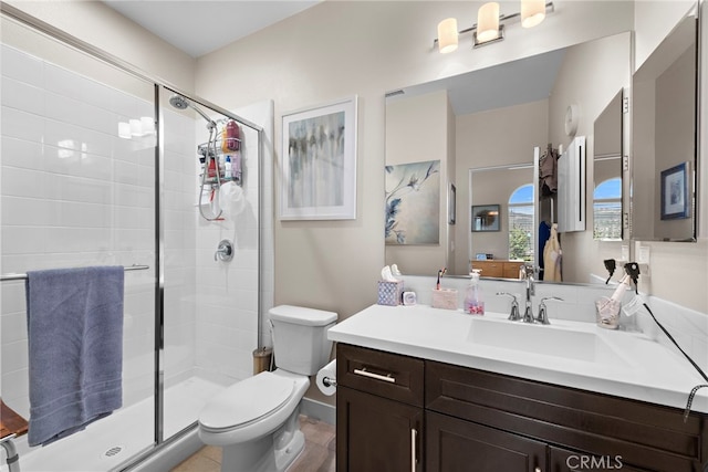 7051 Sitio Caliente, Carlsbad, CA 92009 - full bathroom featuring a shower stall, toilet, and vanity