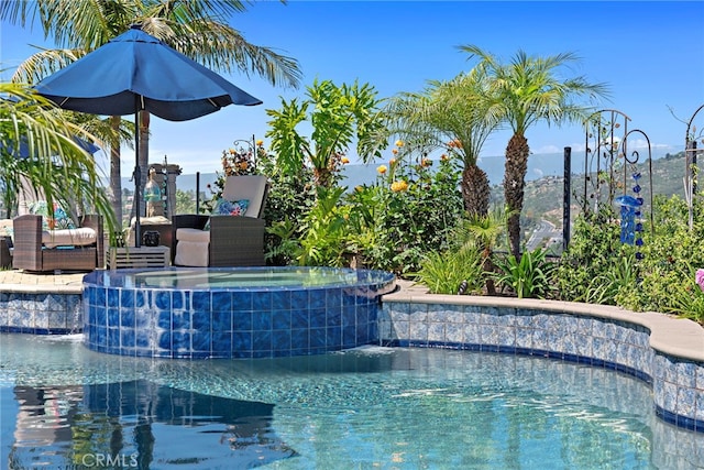 7051 Sitio Caliente, Carlsbad, CA 92009 - view of swimming pool featuring a pool with connected hot tub
