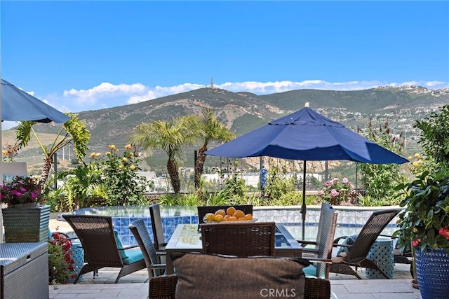 7051 Sitio Caliente, Carlsbad, CA 92009 - view of patio featuring outdoor dining space and a mountain view