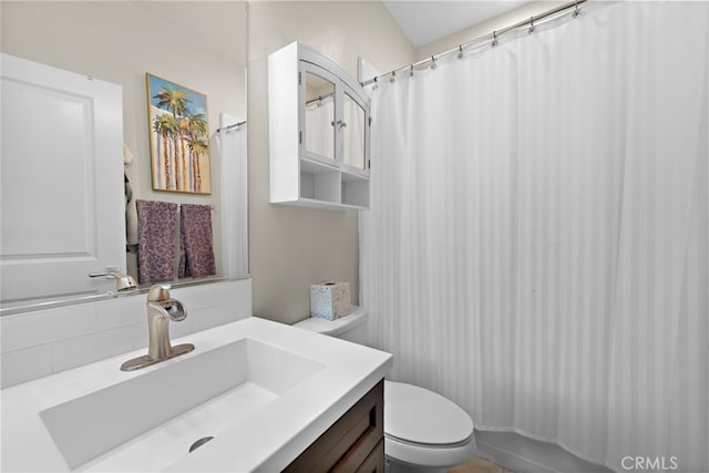 7051 Sitio Caliente, Carlsbad, CA 92009 - bathroom with toilet, vanity, backsplash, and a shower with curtain