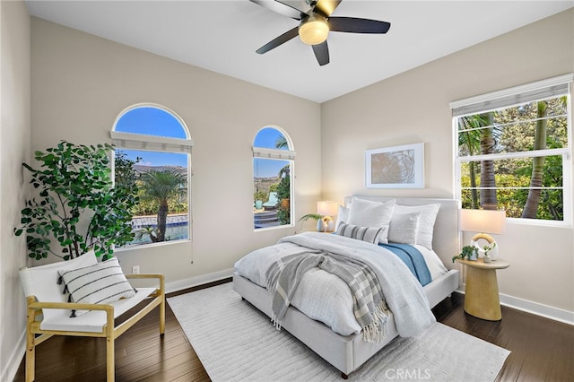 7051 Sitio Caliente, Carlsbad, CA 92009 - bedroom featuring dark wood-style flooring and ceiling fan