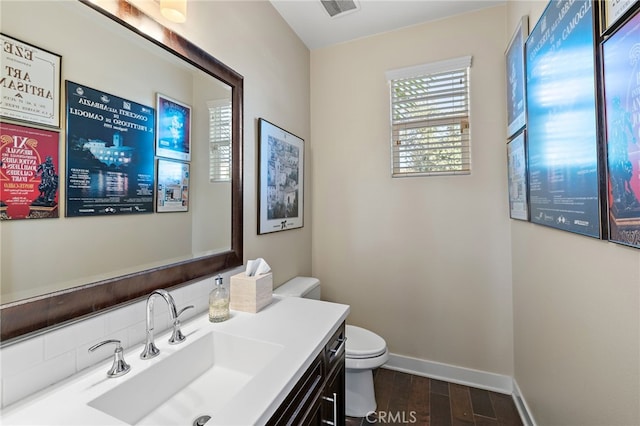 7051 Sitio Caliente, Carlsbad, CA 92009 - bathroom featuring vanity and wood finished floors