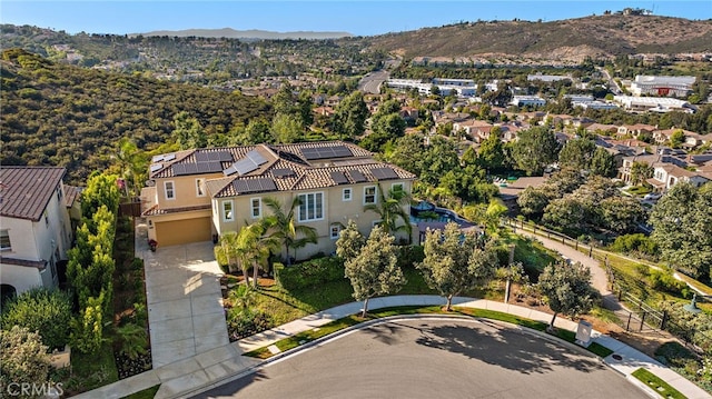 7051 Sitio Caliente, Carlsbad, CA 92009 - aerial view of property's location featuring mountains and nearby suburban area