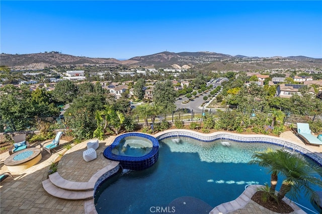 7051 Sitio Caliente, Carlsbad, CA 92009 - view of pool featuring a mountain view, a patio area, and a pool with connected hot tub