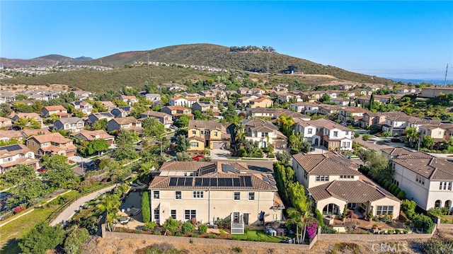 7051 Sitio Caliente, Carlsbad, CA 92009 - aerial perspective of suburban area with a mountainous background