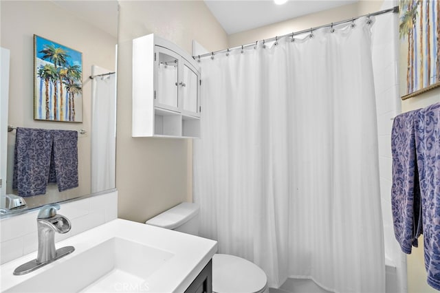 7051 Sitio Caliente, Carlsbad, CA 92009 - bathroom with vanity, backsplash, and shower / tub combo with curtain
