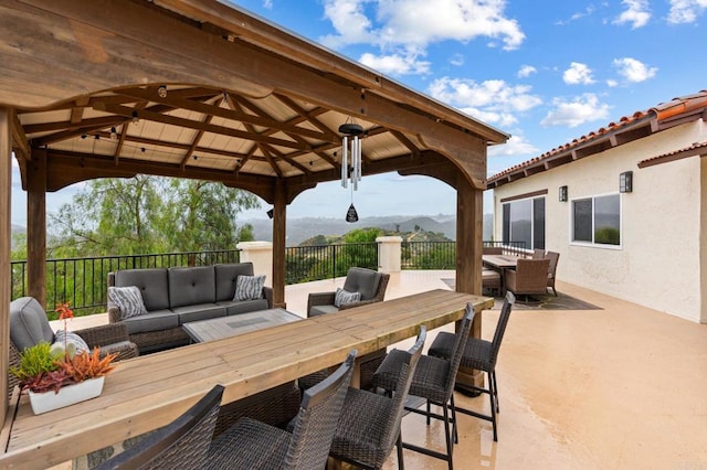 10845 Mystery Mountain Rd, Valley Center, CA 92082 - view of patio / terrace with outdoor dining area, outdoor lounge area, a mountain view, and a gazebo