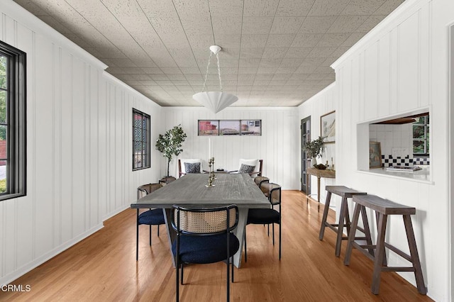 1858 Laurel Bay Dr, Pasadena, CA 91105 - dining area featuring light wood-style flooring and crown molding