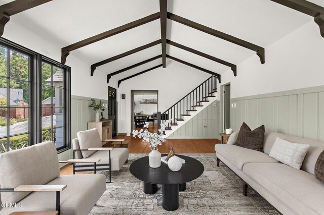 1858 Laurel Bay Dr, Pasadena, CA 91105 - living area with wood finished floors, stairs, beamed ceiling, a wainscoted wall, and a decorative wall