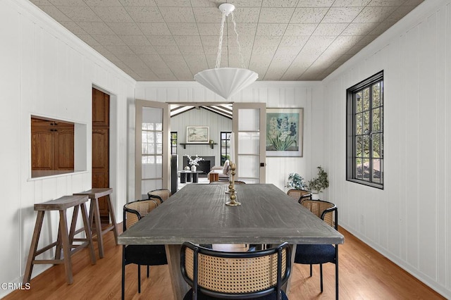 1858 Laurel Bay Dr, Pasadena, CA 91105 - dining room featuring crown molding, light wood-type flooring, and baseboards