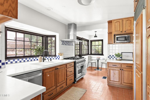 1858 Laurel Bay Dr, Pasadena, CA 91105 - kitchen featuring stainless steel appliances, island exhaust hood, a sink, backsplash, and light countertops