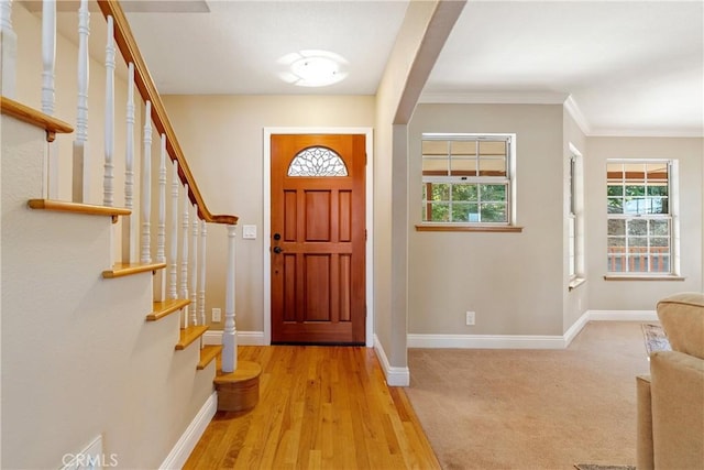 10885 San Marcos Rd, Atascadero, CA 93422 - foyer entrance with baseboards, stairs, crown molding, and wood finished floors